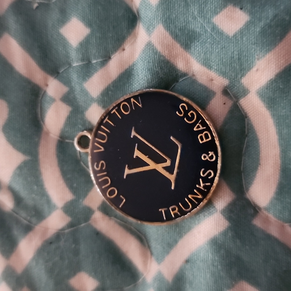 Vintage Louis  Vuitton blue charm.
